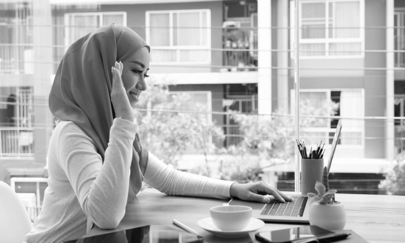 Financial analysts working on valuation models in modern office environment