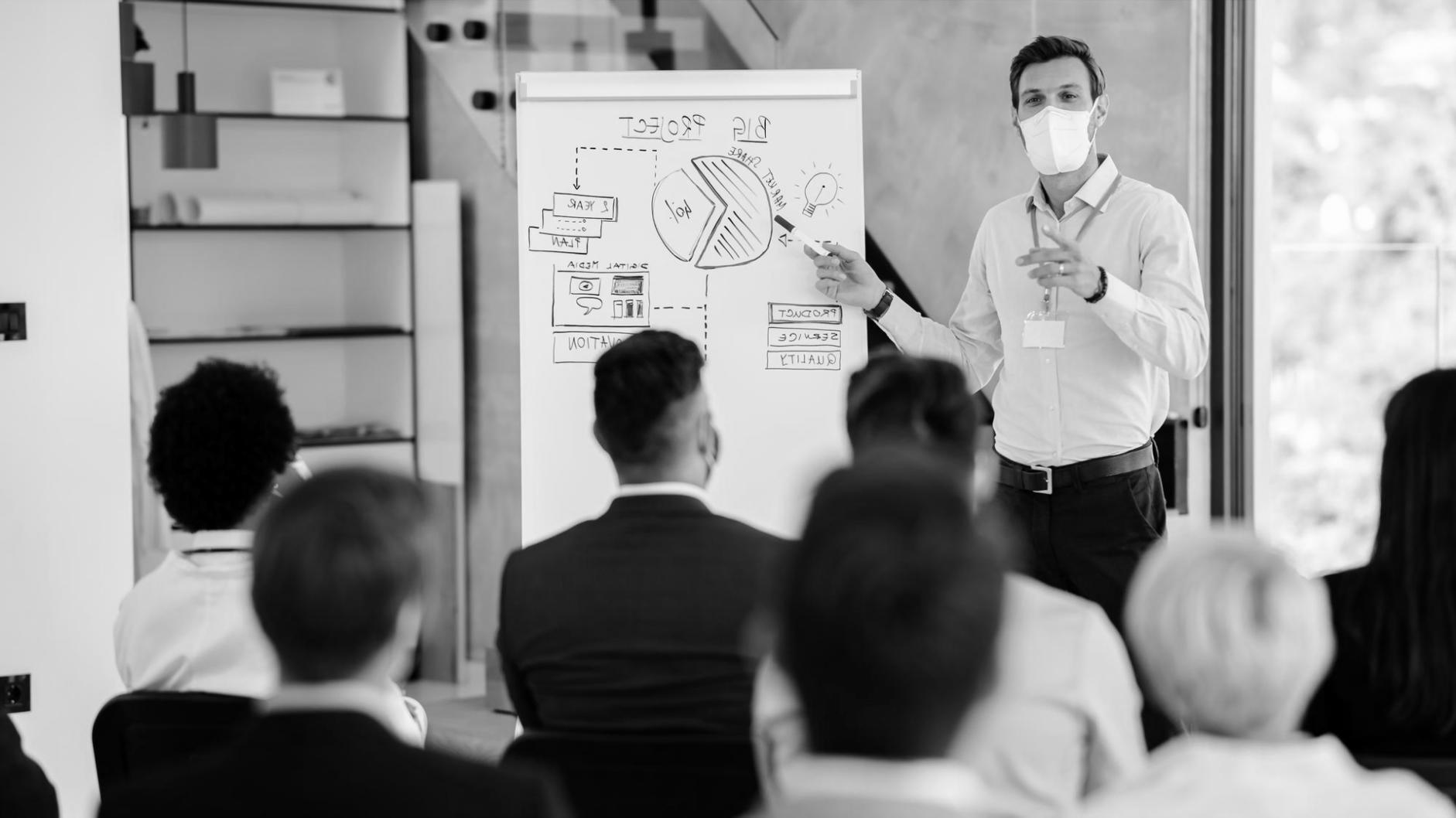 International students using advanced financial modeling software in computer lab